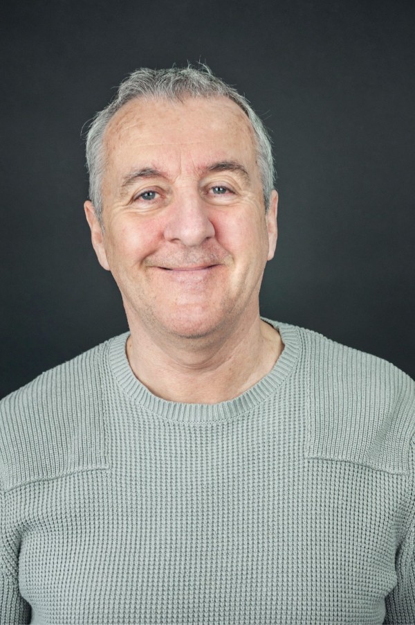 Sean Morrissey - portrait on black background