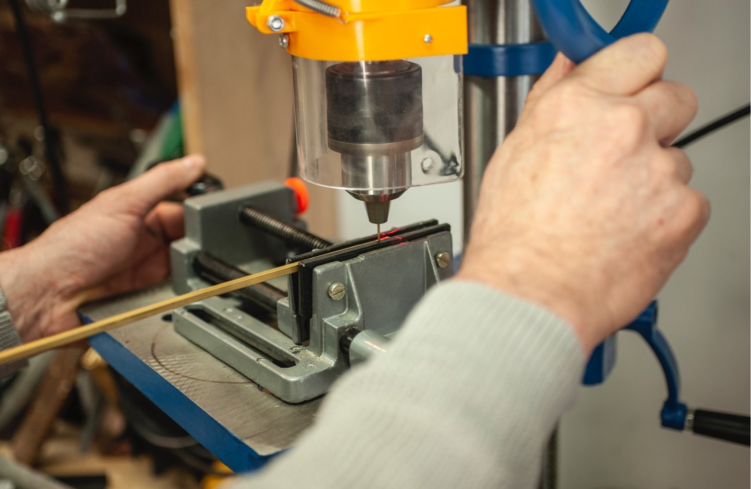 Drilling a hole in a brass tube