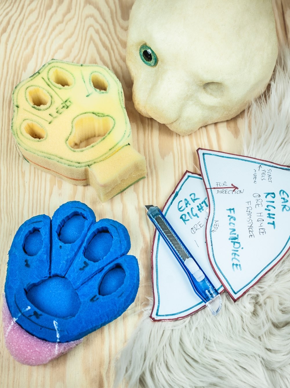Lynx puppet details during production: paws, head and ear patterns